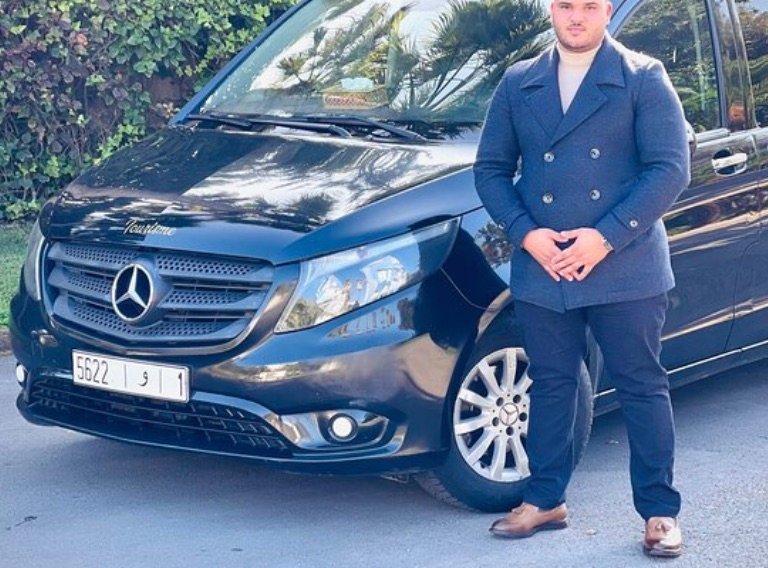 English-speaking Morocco private driver with his Mercedes Vito