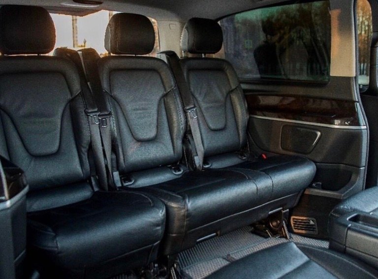 Leather seats inside a Mercedes van with private driver in Morocco